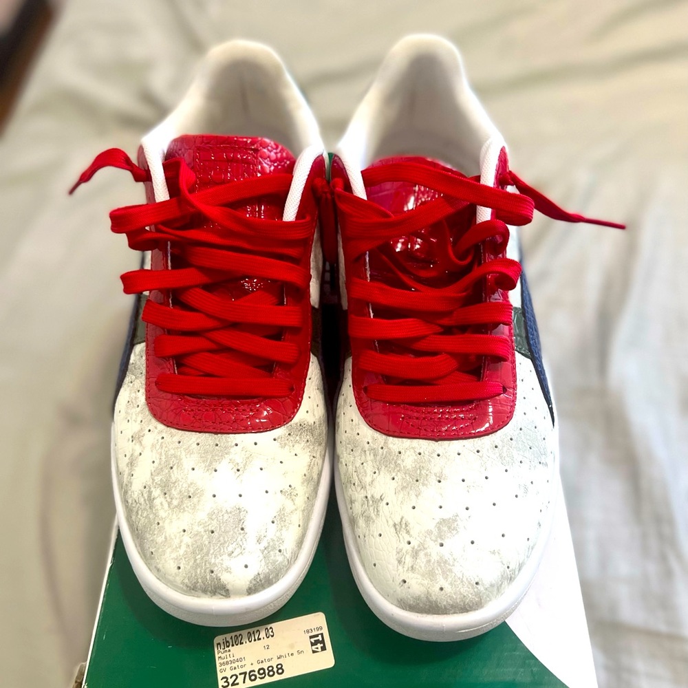 Puma sneakers size 12. Missing in sole. Like new